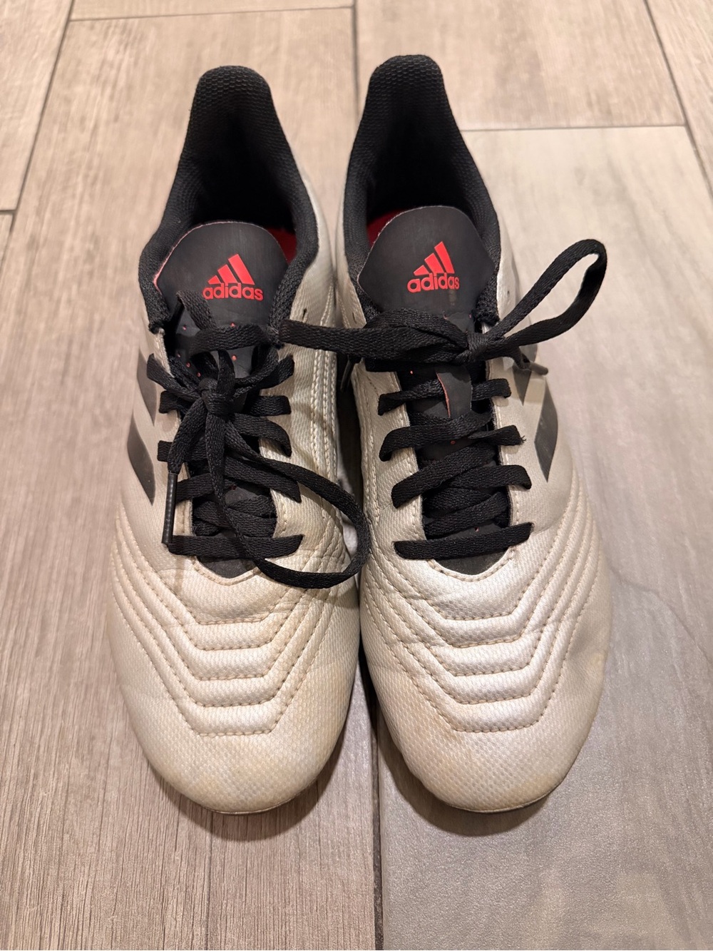 adidas Men’s White and Black Soccer Cleats with Red Logo